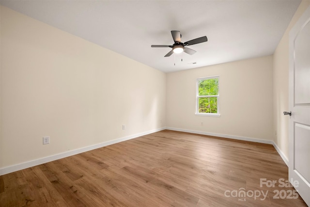 371 Amber Oaks Dr, Rutherfordton, NC 28139 - spare room featuring ceiling fan, light wood finished floors, and baseboards