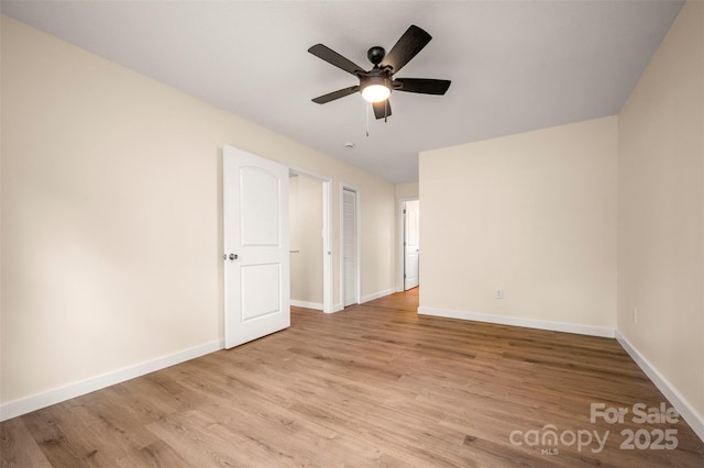 371 Amber Oaks Dr, Rutherfordton, NC 28139 - unfurnished room featuring baseboards, wood finished floors, and ceiling fan