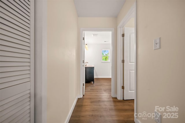 371 Amber Oaks Dr, Rutherfordton, NC 28139 - hallway with dark wood finished floors and baseboards