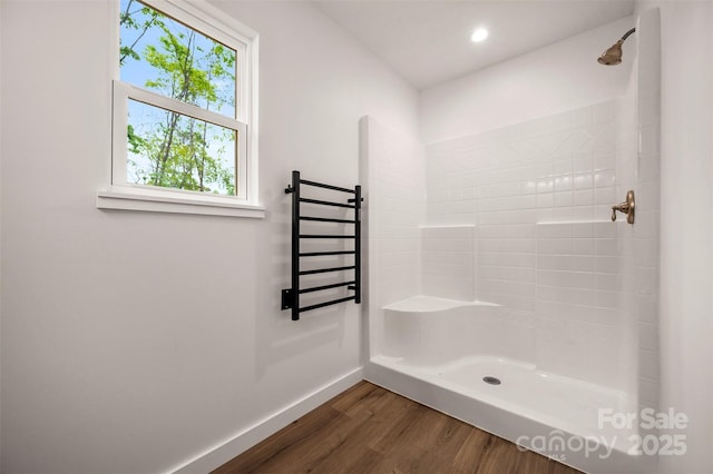 371 Amber Oaks Dr, Rutherfordton, NC 28139 - bathroom with wood finished floors, baseboards, a tile shower, a towel warming rack, and recessed lighting