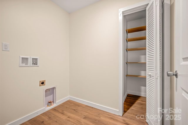 371 Amber Oaks Dr, Rutherfordton, NC 28139 - laundry room with hookup for an electric dryer, washer hookup, baseboards, and light wood-style flooring