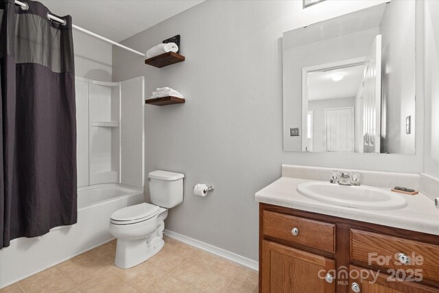 bathroom with tile patterned floors, shower / bath combo, toilet, baseboards, and vanity