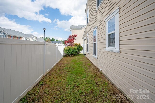 view of yard featuring fence