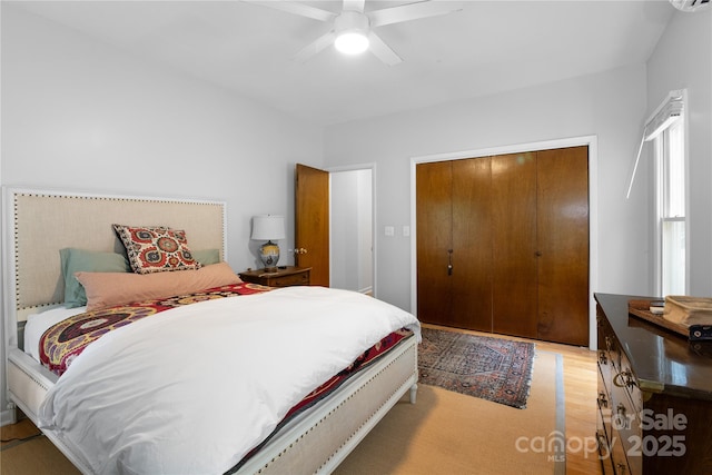 109 Paradise Cir, Clyde, NC 28721 - bedroom featuring light wood finished floors, a closet, and ceiling fan