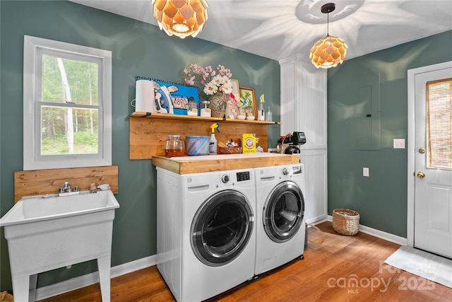 109 Paradise Cir, Clyde, NC 28721 - laundry room featuring independent washer and dryer and wood finished floors