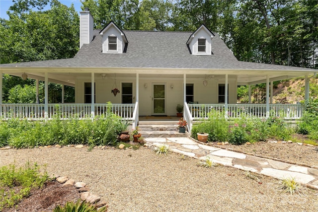 109 Paradise Cir, Clyde, NC 28721 - country-style home featuring a shingled roof, a chimney, and covered porch