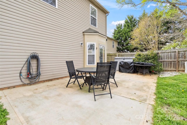view of patio / terrace with a fenced backyard and outdoor dining area