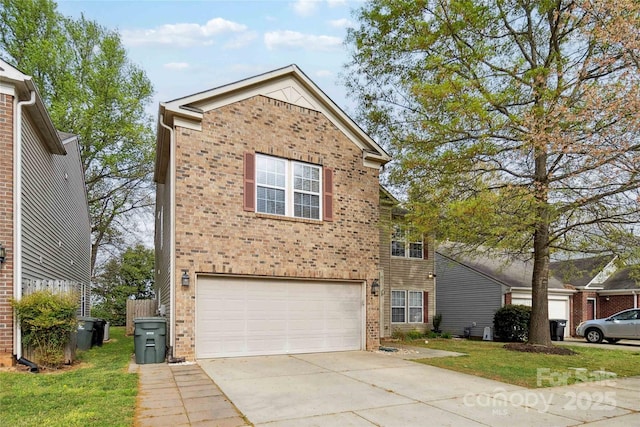 traditional-style house featuring an attached garage, driveway, a front lawn, and brick siding