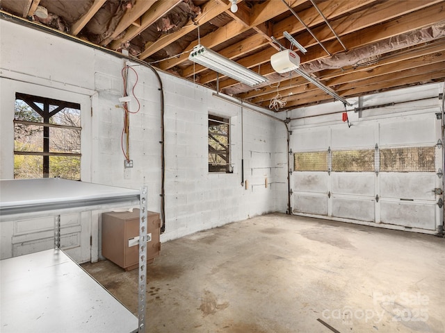 garage featuring a garage door opener