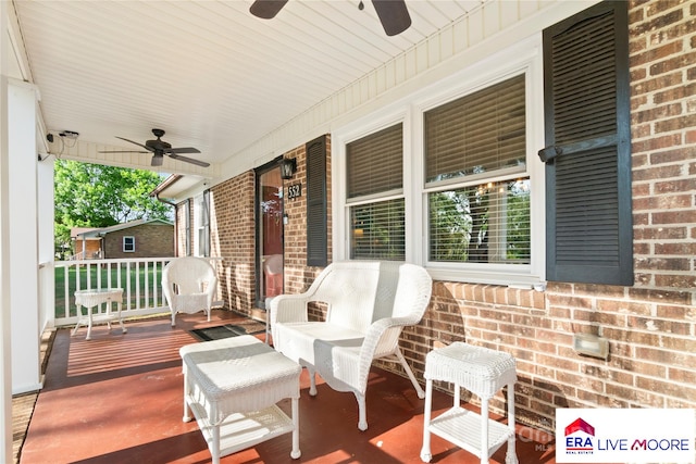 wooden terrace with a porch and a ceiling fan