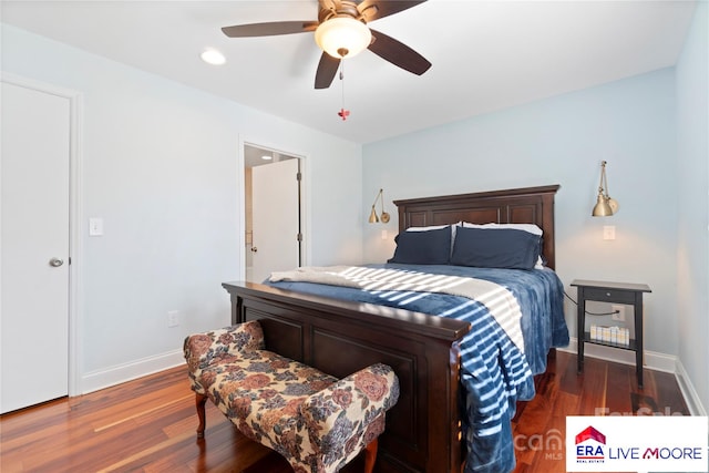 bedroom with baseboards, a ceiling fan, and wood finished floors
