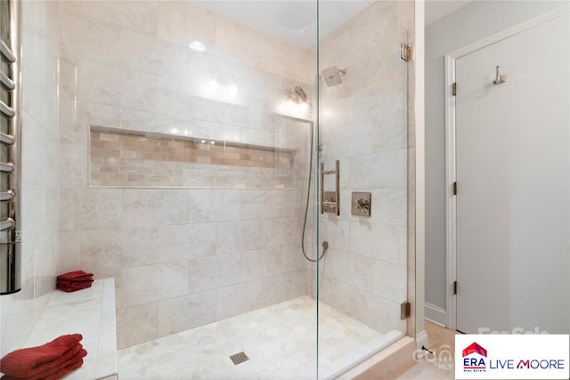 bathroom featuring a shower stall