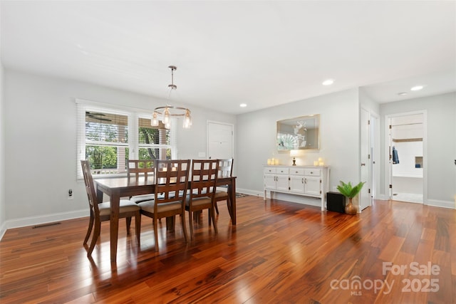 552 Odell School Rd, Concord, NC 28027 - dining room featuring dark wood-style flooring, recessed lighting, baseboards, and a chandelier
