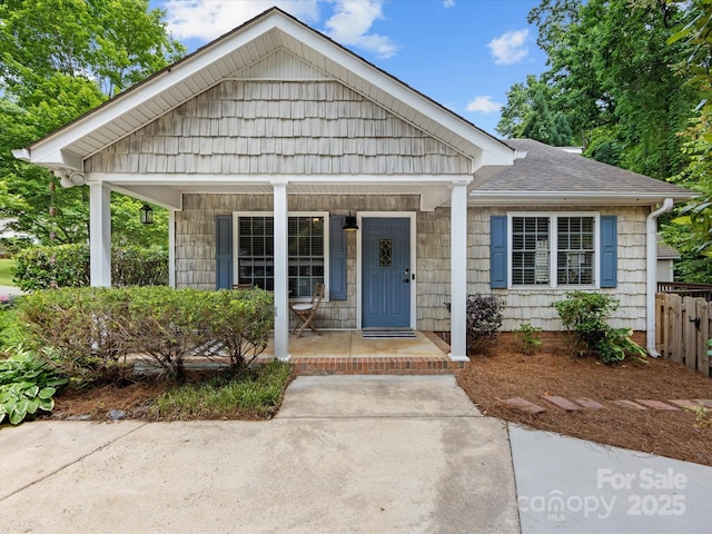 2214 Olde Chantilly Ct, Charlotte, NC 28205 - bungalow-style home featuring a porch and a shingled roof