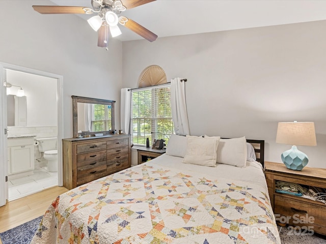 2214 Olde Chantilly Ct, Charlotte, NC 28205 - bedroom featuring wood finished floors, connected bathroom, and ceiling fan