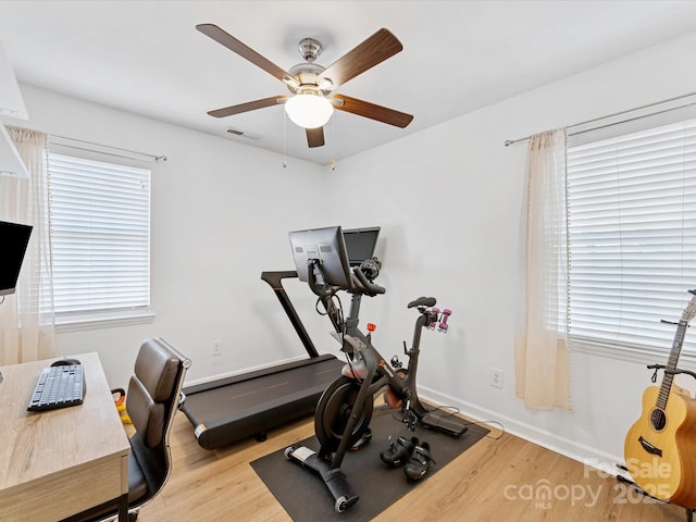 2214 Olde Chantilly Ct, Charlotte, NC 28205 - workout room with ceiling fan, light wood-style floors, and baseboards