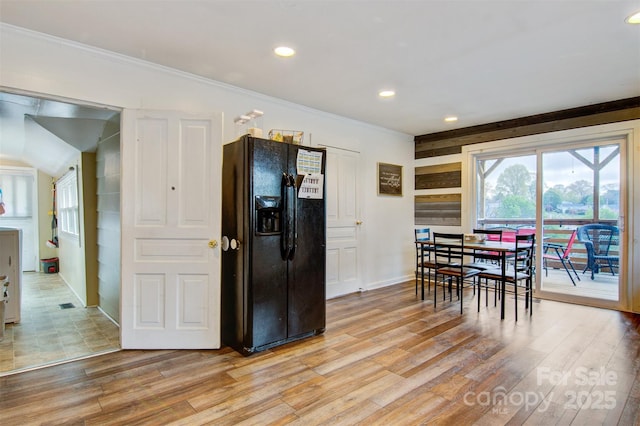 dining space featuring recessed lighting, light wood-style floors, baseboards, and crown molding
