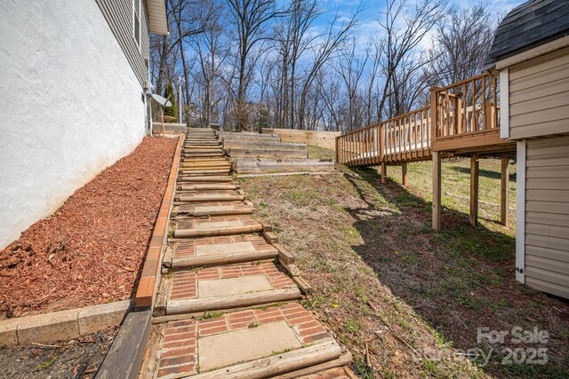 view of yard with a deck