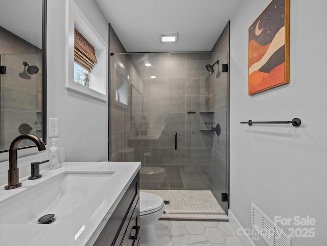 bathroom with a stall shower, visible vents, toilet, and vanity