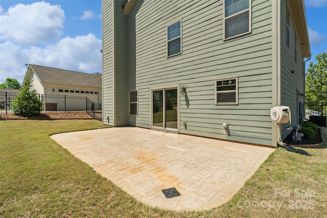 10270 Lakeshore Dr, Lancaster, SC 29720 - back of property featuring a lawn, fence, a patio area, and central AC