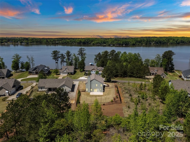 10270 Lakeshore Dr, Lancaster, SC 29720 - aerial view at dusk with a water view and a residential view