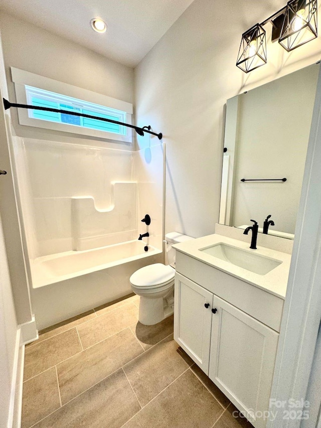 full bathroom featuring vanity, toilet, recessed lighting, tile patterned floors, and shower / washtub combination