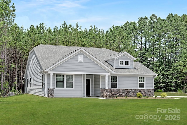 700 Sunset Pointe Dr, Salisbury, NC 28146 - craftsman house featuring stone siding, a front lawn, and roof with shingles