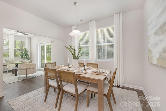 700 Sunset Pointe Dr, Salisbury, NC 28146 - dining space with dark wood-type flooring and ceiling fan