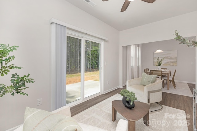 700 Sunset Pointe Dr, Salisbury, NC 28146 - living room featuring dark wood-style floors and a ceiling fan
