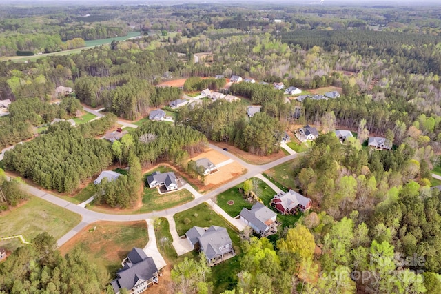 700 Sunset Pointe Dr, Salisbury, NC 28146 - aerial view of property and surrounding area with a heavily wooded area and nearby suburban area