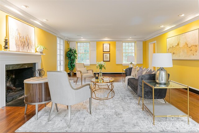 31 Busbee Rd, Asheville, NC 28803 - living room featuring recessed lighting, a fireplace, crown molding, and wood finished floors
