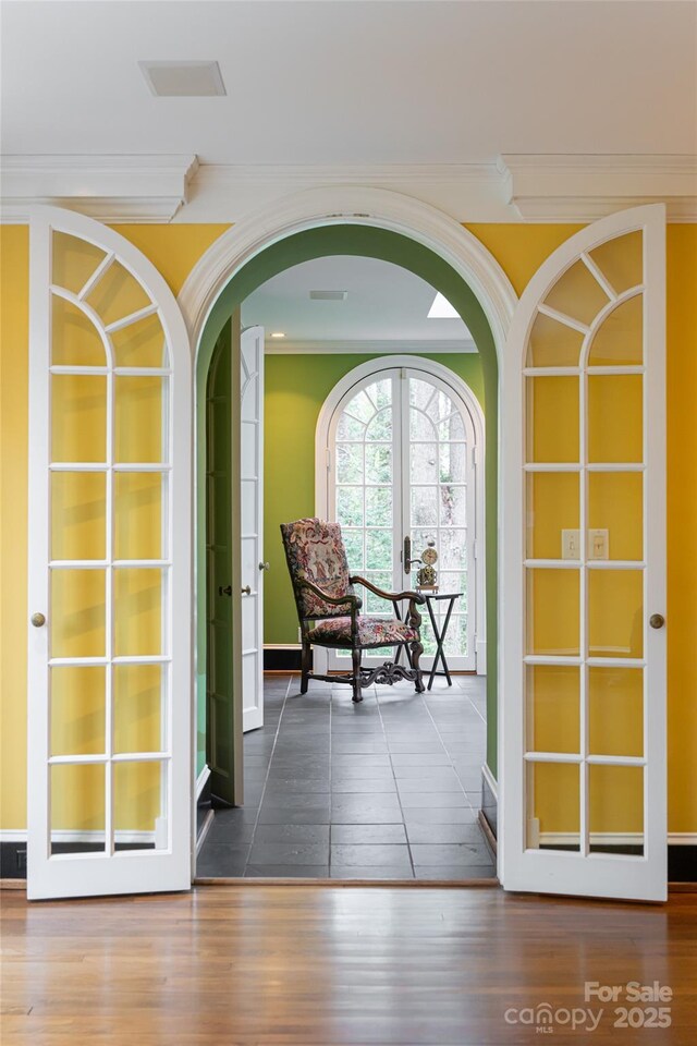 31 Busbee Rd, Asheville, NC 28803 - interior space featuring ornamental molding, french doors, arched walkways, and wood finished floors