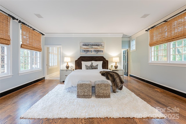 31 Busbee Rd, Asheville, NC 28803 - bedroom with multiple windows, crown molding, and wood finished floors