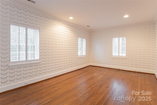 31 Busbee Rd, Asheville, NC 28803 - spare room with baseboards, wallpapered walls, crown molding, and wood finished floors