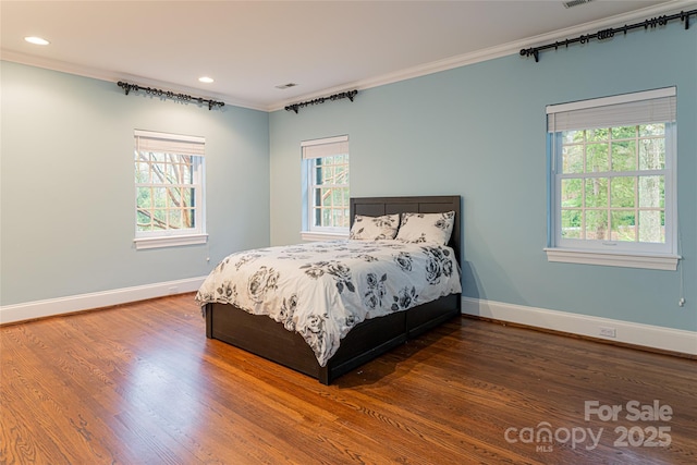 31 Busbee Rd, Asheville, NC 28803 - bedroom with baseboards, multiple windows, ornamental molding, and wood finished floors