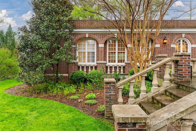 31 Busbee Rd, Asheville, NC 28803 - view of home's exterior featuring stairway and brick siding