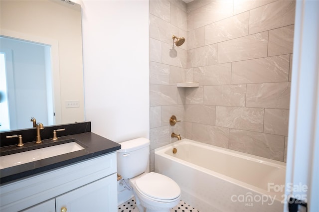 full bath with toilet, vanity, and shower / bathtub combination