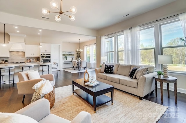 11144 Limehurst Pl, Charlotte, NC 28278 - living area with a chandelier, wood finished floors, and recessed lighting