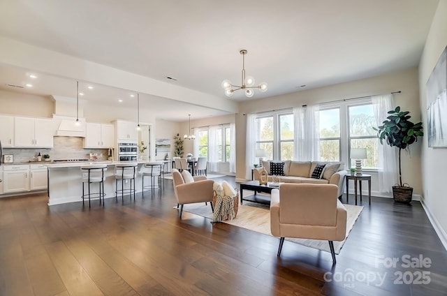 11144 Limehurst Pl, Charlotte, NC 28278 - living area with a chandelier, dark wood-style flooring, and recessed lighting