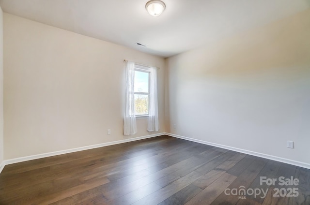 11144 Limehurst Pl, Charlotte, NC 28278 - unfurnished room featuring dark wood-type flooring and baseboards
