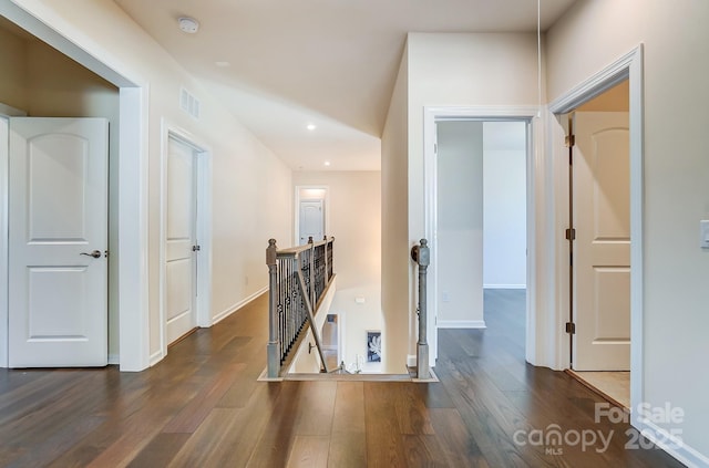11144 Limehurst Pl, Charlotte, NC 28278 - corridor featuring an upstairs landing, dark wood-style flooring, and recessed lighting