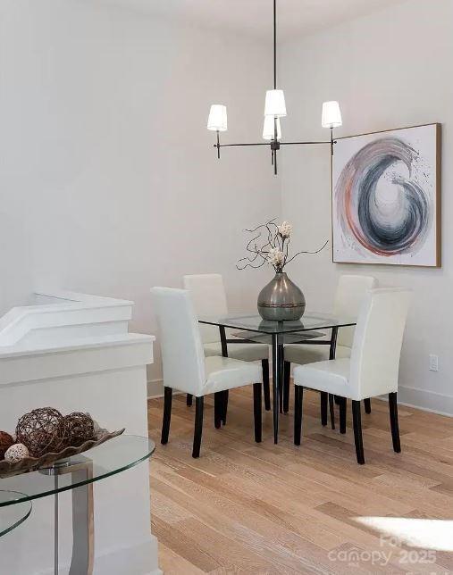 15 Macallan Ln Unit 21, Asheville, NC 28805 - dining area featuring baseboards and light wood-style flooring