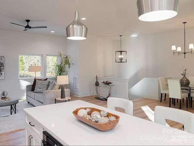15 Macallan Ln Unit 21, Asheville, NC 28805 - dining area with baseboards, recessed lighting, ceiling fan with notable chandelier, and light wood finished floors