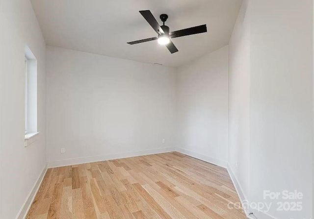 15 Macallan Ln Unit 21, Asheville, NC 28805 - spare room featuring baseboards, light wood-style floors, and a ceiling fan