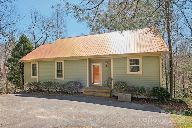 view of front of house with metal roof