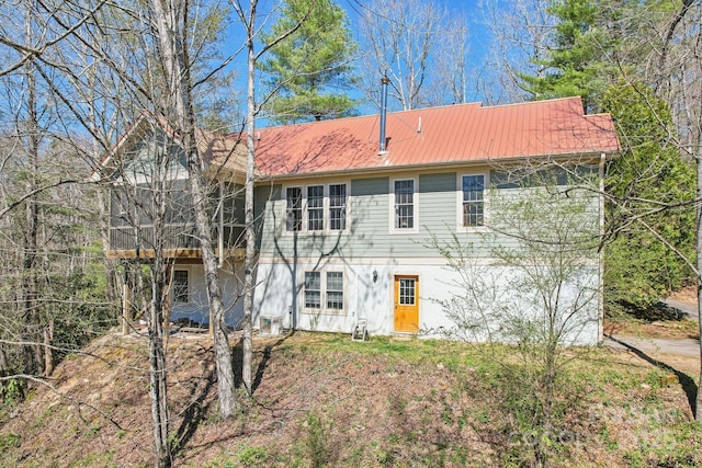 view of front of house featuring metal roof