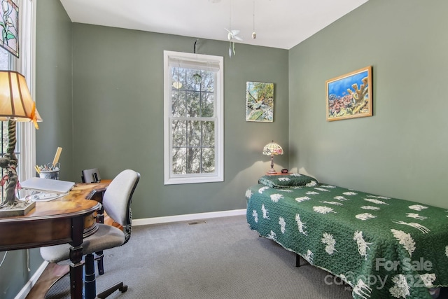 bedroom featuring carpet floors, baseboards, and visible vents