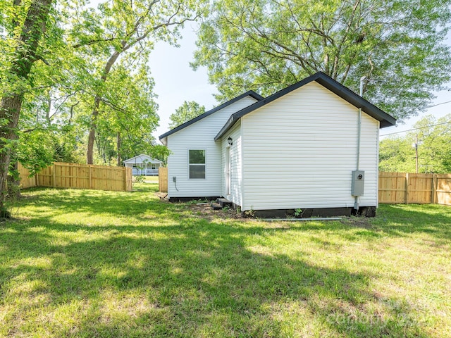 108 Graham St, Chester, SC 29706 - rear view of property with a yard and fence