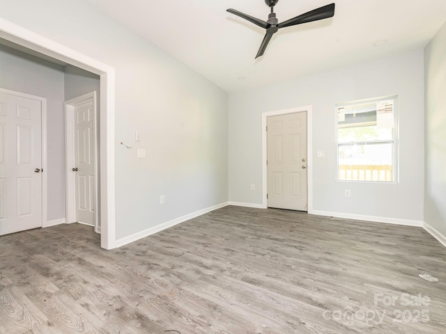 108 Graham St, Chester, SC 29706 - empty room with ceiling fan, baseboards, and wood finished floors