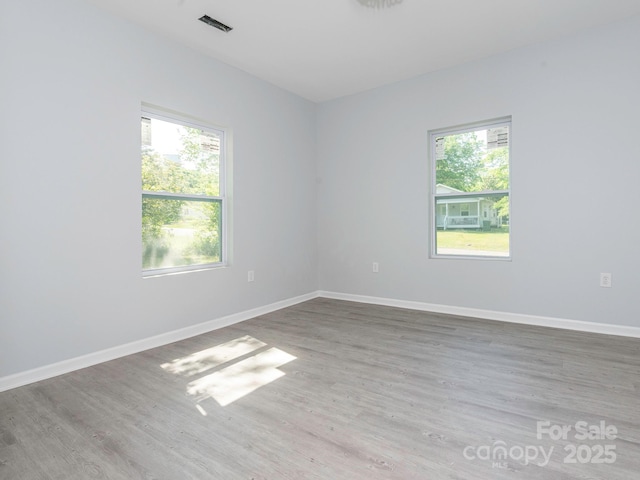 108 Graham St, Chester, SC 29706 - unfurnished room with visible vents, wood finished floors, and baseboards